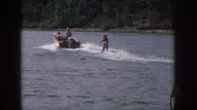 Michigan USA (1961): Boat Pulling Women Behind Skiing On Lake