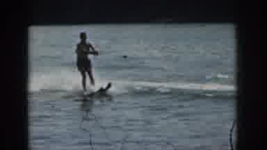 Michigan USA-1961: Man Water Skiing on Lake in Vintage 8mm Home Movie