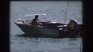 Michigan USA (1961): A Man Prepares And Then Starts Water Skiing As His Friend