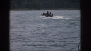 Michigan USA (1961): People Are Boating And Water Skiing On The Lake
