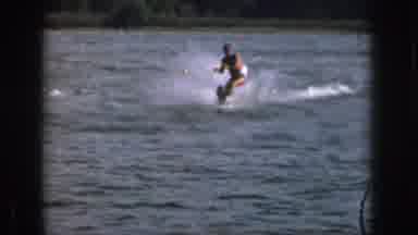 Michigan USA (1961): Man Slalom Skiing Behind A Boat Wipes Out And Ends Up In The