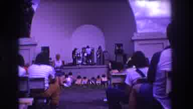 Medford New Jersey USA (1973): A Musical Group On Stage Performing While People
