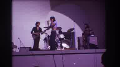 Medford New Jersey USA (1973): Four Band Members Jamming Out In Front Of An