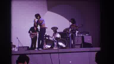 Medford New Jersey USA (1973): An African Man Is On A Stage Performing And A Man