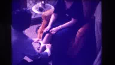 Medford New Jersey USA (1973): Man Slipping A Garter Belt Onto And Up A Woman's