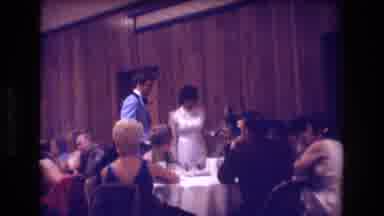Boston USA (1974): Bride And Groom Visiting A Table Of Guests At A Wedding