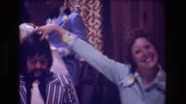 Boston USA (1974): People Dance At A Party While A Woman In A Blue Dress Touches