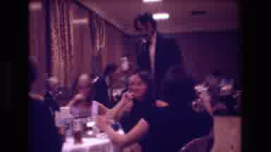 Boston USA (1974): A Large Dinner Party In A Very Large Room As A Man Goes From