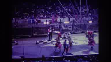 Boston USA (1974): Ladies In Red With Umbrellas During A Circus Performance With