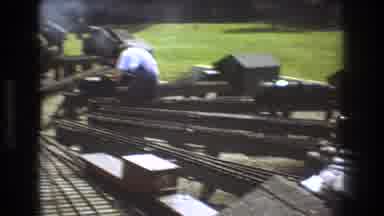 Baxter Maine USA (1975): Train Enthusiasts Working On Their Trains And Tracks In