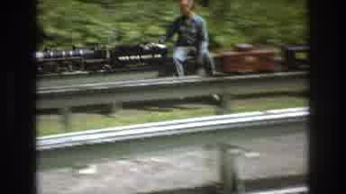 Baxter Maine USA (1975): A Proud Engineer Takes A Ride On The Miniature Train He