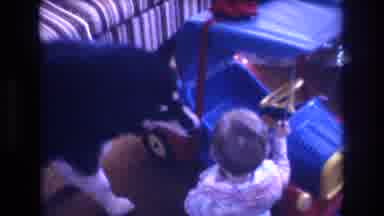 Baxter Maine USA (1975): Child And Dog Examine Blue Toy Car