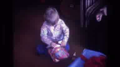 Baxter Maine USA (1975): Young Boy On Carpet Unwrapping Gift Toy Ball With Guitar