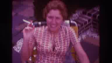 Boston USA (1975): Laughing Brunette Woman On Chair Smoking Wearing Patterned