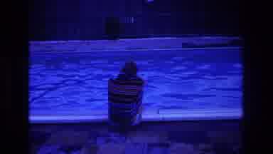 Boston USA (1975): Woman Sits In A State Of Peaceful Reflection At The Edge Of A