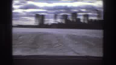 Boston USA (1975): City With Construction Crane As Viewed From A Fast Boat