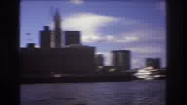 Boston USA (1975): Boat In Water Viewpoint Of Skyscrapers Against Blue Cloudy Sky