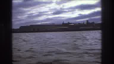 Boston USA (1975): Sea Sky Clouds Airplane Bridge Ship Landscape Industry