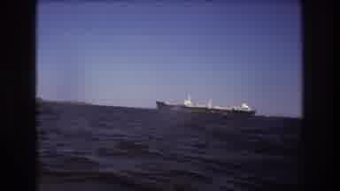Boston USA (1975): Video Taken On A Boat For A Large, Commercial Ship On The Ocean