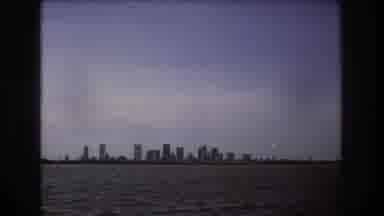 Boston USA (1975): Clouds Water Ocean Towers Building City Bay Blue Sky Grey