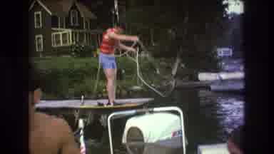 Boston USA (1975): People In A Boat And On A Dock Are Preparing For A Fun Day Of