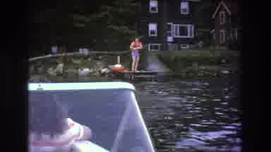 Boston USA (1975): Person Pulling A Boat To A Dock With Rope