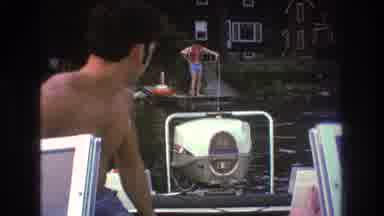Boston USA (1975): Man In Boat Backing Up Into Dock