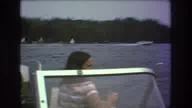 Boston USA (1975): Camera Angle With A Girl In The Boat Watching Something Nearby