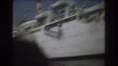 Boston USA (1975): Riding On The Front Of A Small Boat Headed Towards A Big City