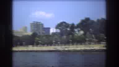Boston USA (1975): Moving Video On Board A Boat Of The Shoreline And Large City
