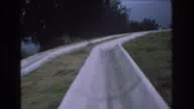 MT Bromley Vermont USA-1976: Sliding Down Concrete Luge Outside In Wooded Area