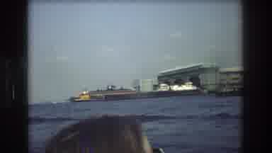 New York City USA (1976): Boat Ride In Urban Harbor Looking At Tall City Buildings