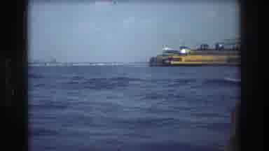 New York City USA (1976): Riding Past The Staten Island Ferry On A Boat In The