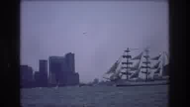 New York City USA (1976): Blimp Flying Through The Air And Ship Sailing On The