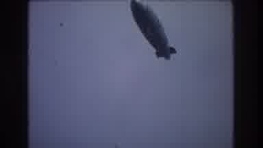 New York City USA (1976): The Goodyear Zeppelin Flying Overhead And Several Boats