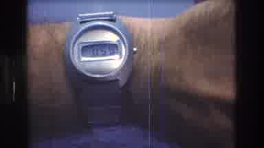 New York City USA (1976): Man Shows Digital Wrist Watch With Time 1:59