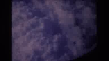 Honolulu Hawaii a USA (1977): Passenger Jet Flying Through Clouds As The Passenger