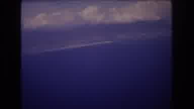 Honolulu Hawaii a USA (1977): Thick White Clouds Roll Across The A Dark Blue Sky