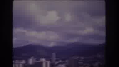 Honolulu Hawaii a USA (1977): City Downtown With Hills In Background And Cloudy