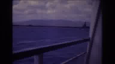 Honolulu Hawaii a USA (1977): Looping Fuzzy Video Body Of Water With Mountain And