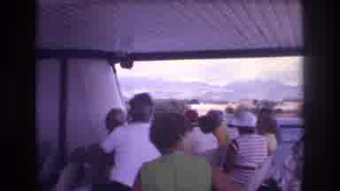 Honolulu Hawaii a USA (1977): People On Moving Boat Look Out Over The Water And