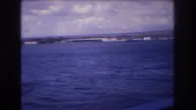 Honolulu Hawaii a USA (1977): Panning A Large Body Of Water With Landscape Behind