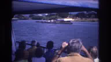 Honolulu Hawaii a USA (1977): People On A Boat On The Water Looking At Barg In The