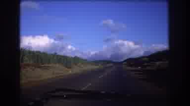 Honolulu Oahu Hawaii USA (1977): A Car Driving Through A Road With Beautiful