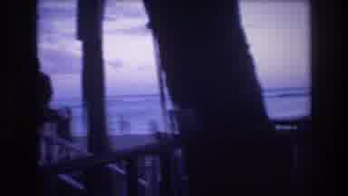 Honolulu Oahu Hawaii USA (1977): People Being Watched On A Beach From A Bungalow