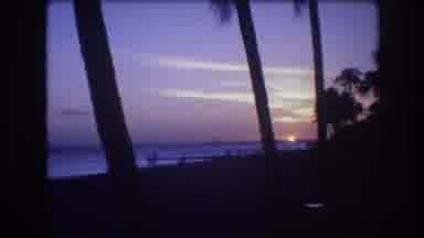 Honolulu Oahu Hawaii USA (1977): The Sun Is Setting In The Distance While Many