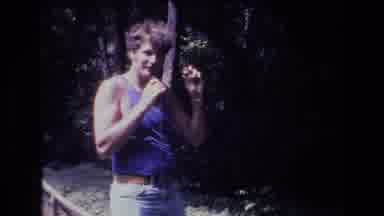 Honolulu Oahu Hawaii USA (1977): Man Holding S Wire Talks To A Parrot In A Cage