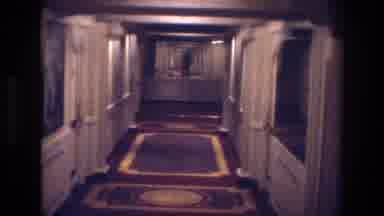Las Vegas USA (1977): Man Walking Through Rooms In A Hotel And Facing A Mirror