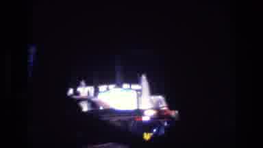 Las Vegas USA (1977): Car Cruising Down The Street At Night Lights Flickering On