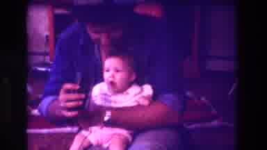 San Diego C USA (1981): Dad Playing With Little Infant Girl On His Lap, Showing
